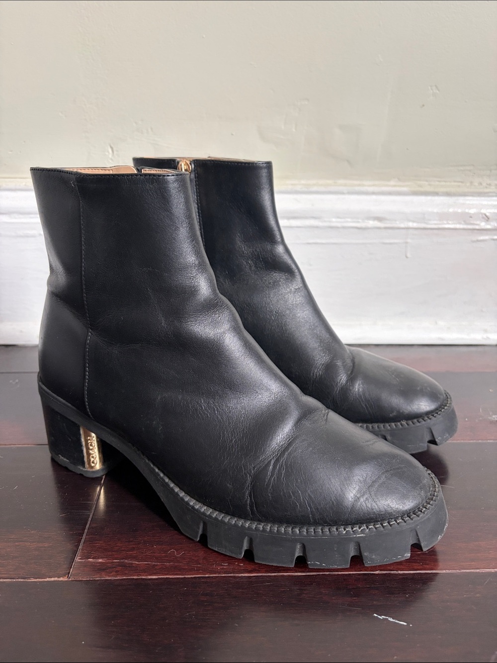 Black coach leather ankle boots
